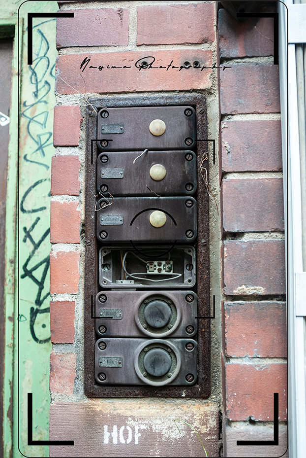 doorbells on a brick wall in frankfurt am main Naxos Halle