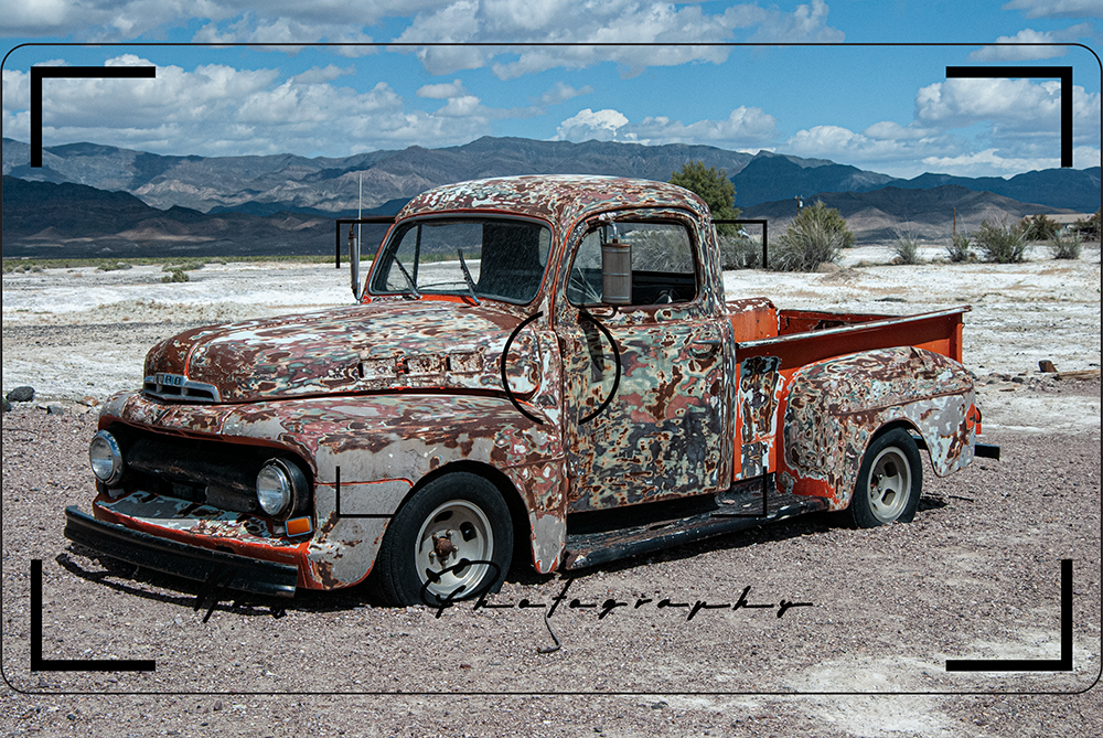 a rusty pick up truck in the Mojave Desert in Tecopa