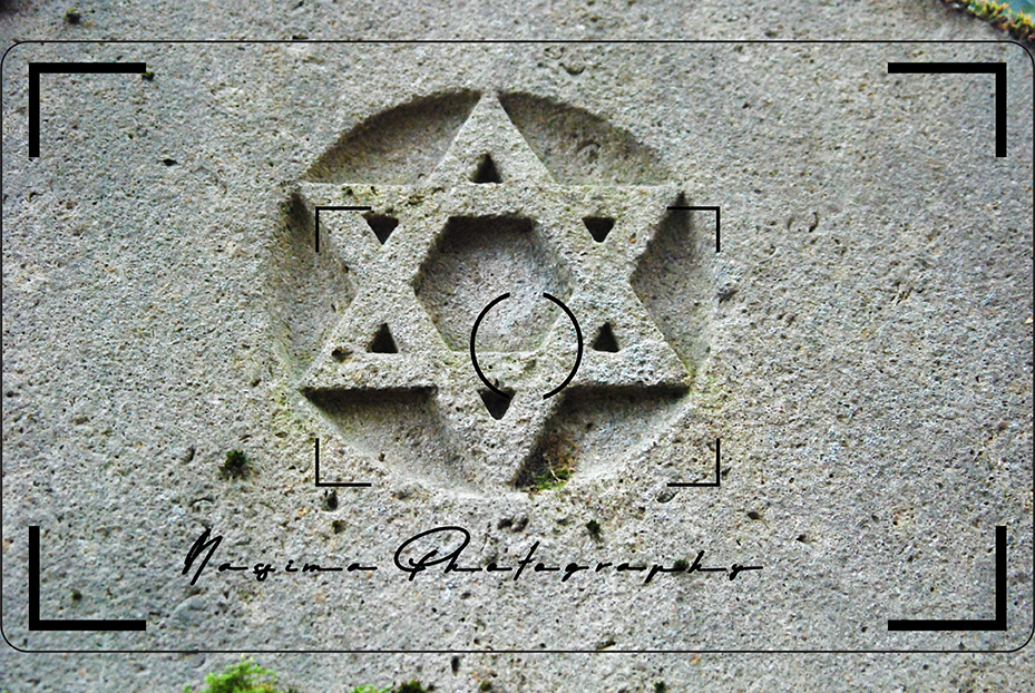 In Stein gemeißelter Davidstern auf einem Grabstein des Alten Jüdischen Friedhofs in Frankfurt am Main.