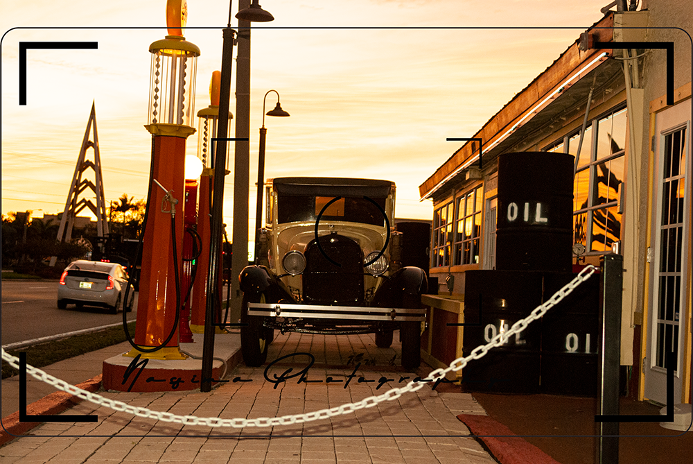 an old Ford I in front of an historic gas station in the sunset in Cape Coral, FLorida